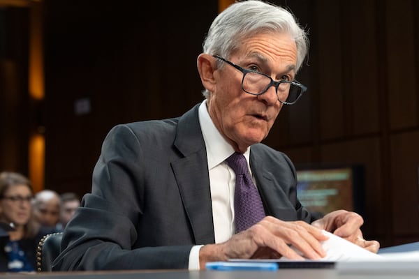 Federal Reserve Chair Jerome Powell takes his seat to speak to the Senate Banking Committee, Tuesday, Feb. 11, 2025, on Capitol Hill in Washington. (AP Photo/Jacquelyn Martin)