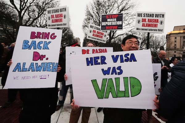 Protesters rally outside the Rhode Island State House in support of deported Brown University Dr. Rasha Alawieh, Monday, March 17, 2025, in Providence, R.I. (AP Photo/Charles Krupa)