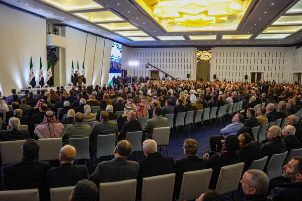 Participants attend Syria's national dialogue conference at the People's Palace in Damascus, Syria, Tuesday Feb. 25, 2025. (AP Photo/Omar Albam)