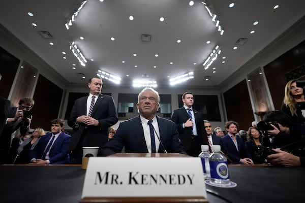 Robert F. Kennedy Jr., President Donald Trump's choice to be Secretary of Health and Human Services, appears before the Senate Finance Committee for his confirmation hearing, at the Capitol in Washington, Wednesday, Jan. 29, 2025. (AP Photo/Ben Curtis)