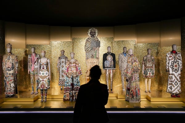 Creations are displayed during the exhibition "From the Heart to the Hands: Dolce&Gabbana" at the Grand Palais, in Paris, Thursday, Jan. 9, 2025. (AP Photo/Thibault Camus)