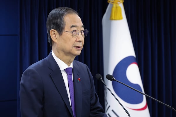 South Korean acting President Han Duck-soo speaks at the government complex in Seoul, South Korea, Thursday, Dec. 26, 2024. (Choi Jae-koo/Yonhap via AP)