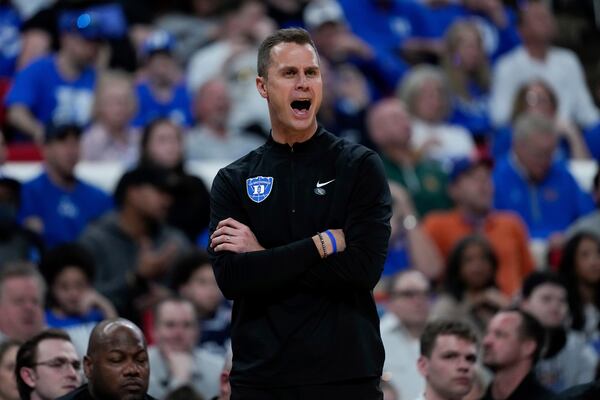 Duke head coach Jon Scheyer reacts during the first half in the first round of the NCAA college basketball tournament against Mount St. Mary's, Friday, March 21, 2025, in Raleigh, N.C. (AP Photo/Stephanie Scarbrough)