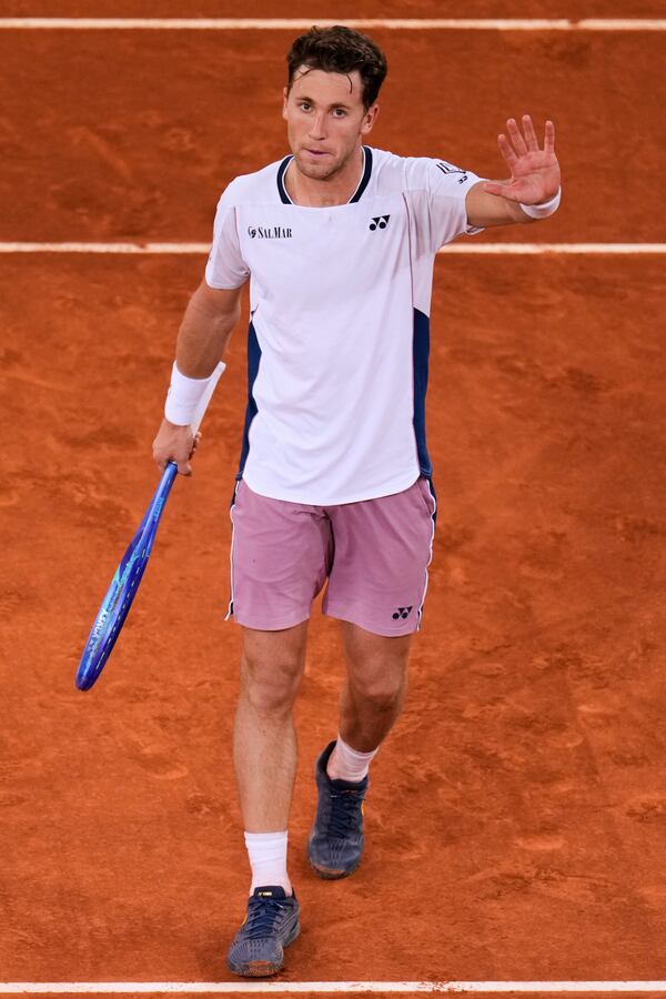 Casper Ruud of Norway celebrates after winning against Francisco Cerundolo from Argentina during men's semifinal at the Madrid Open tennis tournament in Madrid, Spain, Friday, May 2, 2025. (AP Photo/Manu Fernandez)