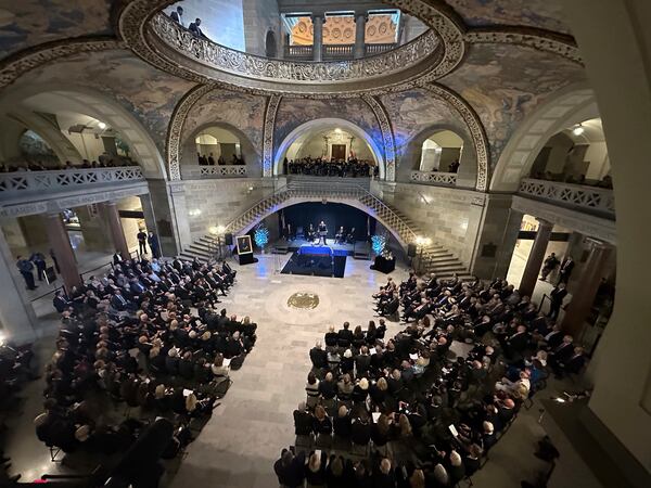 Hundreds of people gather in the Missouri Capitol Rotunda for the memorial service of former Missouri Gov. and U.S. Sen. Christoper Kit Bond on Tuesday, May 20, 2025, in Jefferson City, Mo. (AP Photo/David A. Lieb)