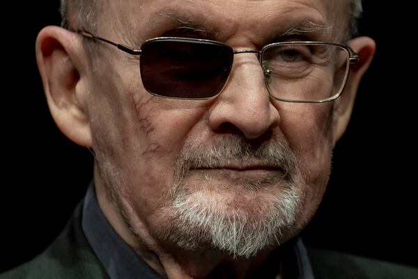 FILE - Author Salman Rushdie poses for a portrait to promote his book "Knife: Meditations After an Attempted Murder", at the Deutsches Theater in Berlin, Germany, May 16, 2024. (AP Photo/Ebrahim Noroozi, File)