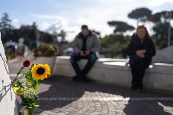 Faithful pray outside Agostino Gemelli Polyclinic, in Rome, Friday, Feb. 28, 2025 where Pope Francis has been hospitalized since Friday, Feb. 14. (AP Photo/Mosa'ab Elshamy)