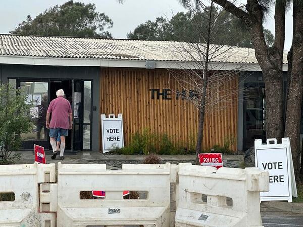 People enter a polling station in the town of of Boca Chica, Texas, that would become Starbase, Texas, if local residents approve a measure to make the home of Elon Musk's SpaceX its own city on Saturday, May 3, 2025. (AP Photo/Valerie Gonzalez)