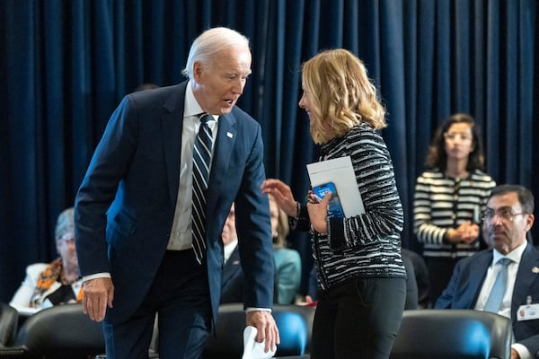 FILE - U.S. President Joe Biden talks to Italy's Prime Minister Giorgia Meloni at the meeting of the Global Coalition to Address Synthetic Drug Threats in New York, Sept. 24, 2024. (AP Photo/Manuel Balce Ceneta, File)