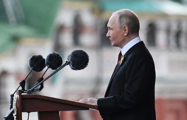 Russian President Vladimir Putin speaks during the Victory Day military parade in Moscow, Russia, Friday, May 9, 2025, during celebrations of the 80th anniversary of the Soviet Union's victory over Nazi Germany during the World War II. (Ilya Pitalev/Photo host agency RIA Novosti via AP)