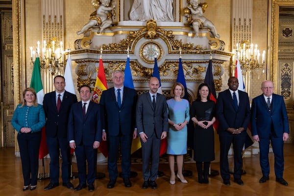 From left, Italian Undersecretary of State for Foreign Affairs Maria Tripodi, Polish Foreign Minister Radoslaw Sikorski, Spanish Foreign Minister Jose Manuel Albares, Ukrainian Foreign Minister Andrii Sybiha, French Foreign Minister Jean-Noel Barrot, High Representative for Foreign Affairs and Security Policy and Vice-President of the European Commission Kaja Kallas, German Foreign Minister Annalena Baerbock, British Foreign Secretary David Lammy, and European Commissioner for Defense and Space Andrius Kubilius pose for a group photo during a meeting on European defence and Ukraine, at the Quai d'Orsay in Paris, France, Wednesday, Feb. 12, 2025. (Christophe Petit-Tesson, Pool Photo via AP)