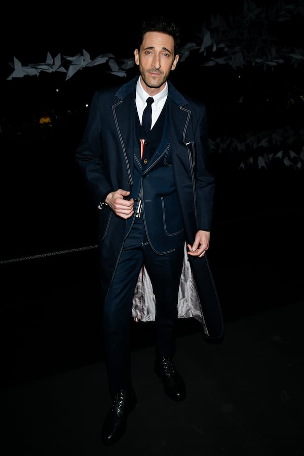 Adrien Brody attends the Thom Browne Fall/Winter 2025 fashion show as part of New York Fashion Week on Tuesday, Feb. 11, 2025, at The Shed in New York. (Photo by Evan Agostini/Invision/AP)