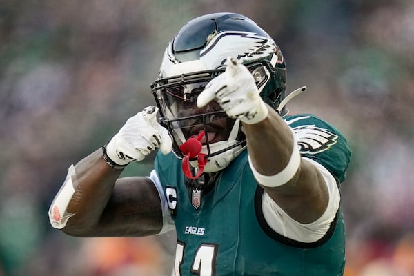 Philadelphia Eagles wide receiver A.J. Brown celebrates after a first down against the Washington Commanders during the first half of the NFC Championship NFL football game, Sunday, Jan. 26, 2025, in Philadelphia. (AP Photo/Seth Wenig)