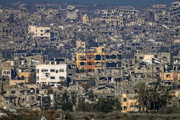 A destroyed part of Gaza City as seen from southern Israel, Thursday Jan. 2, 2025. (AP Photo/Tsafrir Abayov))