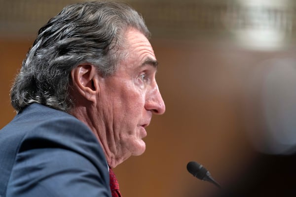 Former Gov. Doug Burgum, President-elect Donald Trump's choice to lead the the Interior Department as Secretary of the Interior, testifies before the Senate Energy and Natural Resources Committee on Capitol Hill in Washington, Thursday, Jan. 16, 2025. (AP Photo/Jose Luis Magana)