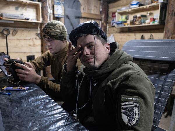 In this photo provided by Ukraine's 93rd Kholodnyi Yar Separate Mechanized Brigade press service, soldiers operate an FPV drones in a shelter in Kramatorsk direction, Donetsk region, Ukraine, Saturday, March 22, 2025. (Iryna Rybakova/Ukraine's 93rd Mechanized Brigade via AP)