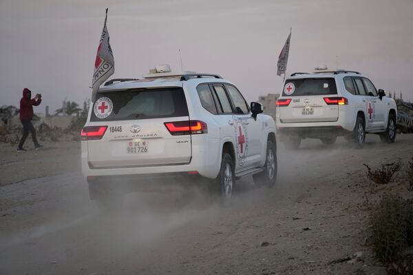 Red Cross vehicles carrying American-Israeli hostage and soldier Edan Alexander leave the Gaza Strip after he was handed over to the organization, Monday, May 12, 2025. (AP Photo/Abdel Kareem Hana)