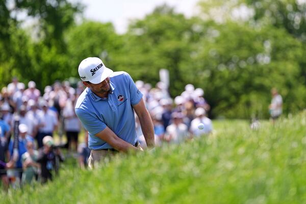 Keegan Bradley hits on the tenth hole during the first round of the Truist Championship golf tournament at the Philadelphia Cricket Club, Thursday, May 8, 2025, in Flourtown. (AP Photo/Matt Rourke)