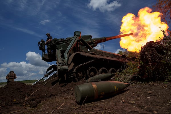 FILE - Ukrainian soldiers of the 43rd Artillery Brigade fire a howitzer toward Russian positions at the front line in the Donetsk region of eastern Ukraine on June 24, 2024. (AP Photo/Evgeniy Maloletka, File)