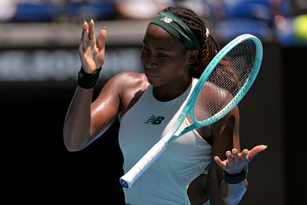 Coco Gauff of the U.S. reacts during her quarterfinal match against Paula Badosa of Spain at the Australian Open tennis championship in Melbourne, Australia, Tuesday, Jan. 21, 2025. (AP Photo/Ng Han Guan)