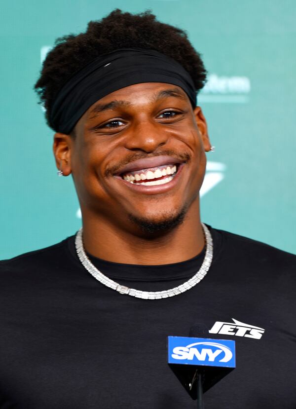 New York Jets linebacker Giovanni Williams responds to questions from media during the NFL football team's rookie camp, Saturday, May 10, 2025, in Florham Park, N.J. (AP Photo/Noah K. Murray)