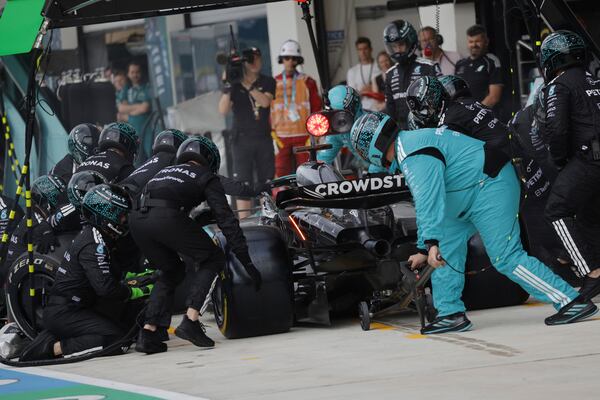 Mercedes driver George Russell of Britain makes a pit stop during the Formula One Miami Grand Prix auto race Sunday, May 4, 2025, in Miami Gardens. Fla. (Shawn Thew/Pool Photo via AP)