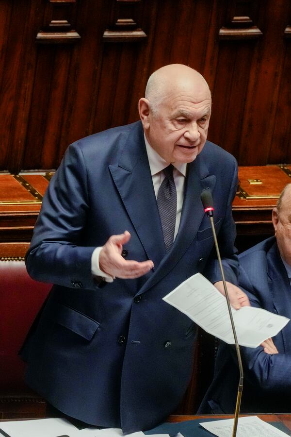 Italian Justice Minister Carlo Nordio speaks during a debate in the Italian lower Chamber in Rome, Wednesday, Feb. 5, 2025, over the controversial repatriation, last week, of a Libyan warlord, Ossama Anjiem, also known as Ossama al-Masri, wanted by the International Criminal Court in the Hague, and who had been arrested in Turin, northern Italy. (AP Photo/Gregorio Borgia)