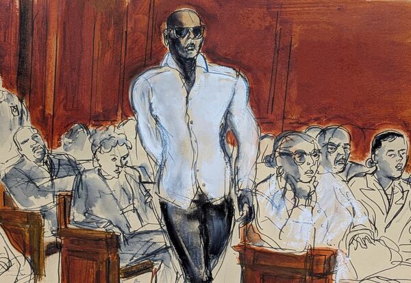 Witness Daniel Philip walks into the courtroom in Manhattan federal court, Tuesday, May 13, 2025, in New York. (Elizabeth Williams via AP)