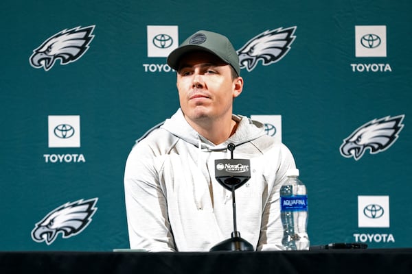 Philadelphia Eagles offensive coordinator Kellen Moore speaks with members of the media during a news conference at the NFL football team's training facility, Tuesday, Jan. 21, 2025, in Philadelphia. (AP Photo/Chris Szagola)