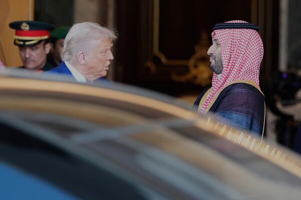 President Donald Trump speaks with Saudi Crown Prince Mohammed bin Salman as he leaves the Royal Palace after a signing ceremony with Saudi Crown Prince Mohammed bin Salman in Riyadh, Saudi Arabia, Tuesday, May 13, 2025. (AP Photo/Alex Brandon)