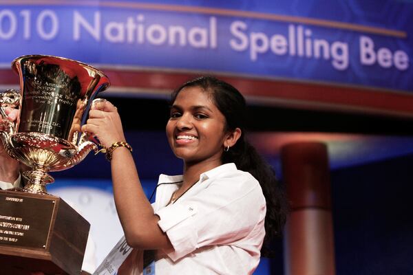 FILE - Anamika Veeramani, 14, of North Royalton, Ohio, holds her trophy after winning the 2010 National Spelling Bee in Washington, June 4, 2010. (AP Photo/Jacquelyn Martin, File)
