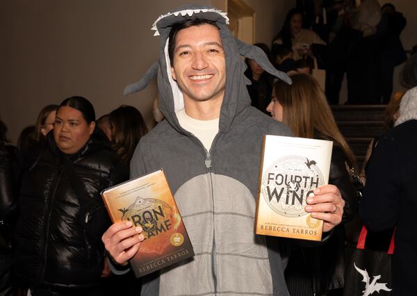 Audience member attends author Rebecca Yarros in conversation of her new book "Onyx Storm" at The Town Hall on Friday, Jan. 24, 2025, in New York. (Photo by CJ Rivera/Invision/AP)