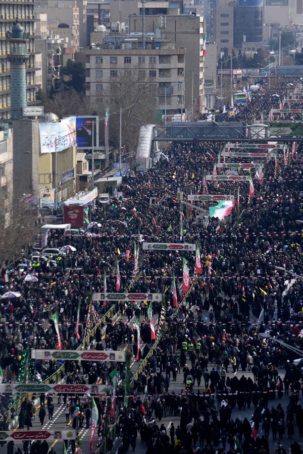 Iranians march during a rally commemorating anniversary of 1979 Islamic Revolution that toppled the late pro-U.S. Shah Mohammad Reza Pahlavi and brought Islamic clerics to power, in Tehran, Iran, Monday, Feb. 10, 2025. (AP Photo/Vahid Salemi)