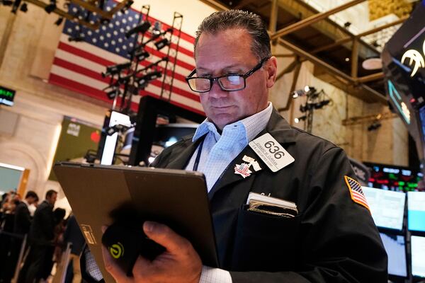 Trader Edward Curran works on the floor of the New York Stock Exchange, Tuesday, May 20, 2025. (AP Photo/Richard Drew)