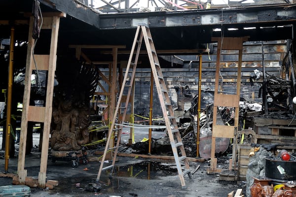 FILE - A ladder stands inside the charred warehouse Tuesday, Dec. 13, 2016, in Oakland, Calif. The fire, which happened on Friday, Dec 2, killed dozens of people during a electronic dance party as it raced through the building, in the deadliest structure fire in the U.S. in more than a decade. (AP Photo/Marcio Jose Sanchez, File)