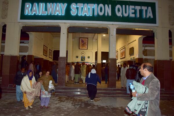 Passengers rescued by security forces from a passenger train attacked by insurgents arrive at a railway station in Quetta, Pakistan, Wednesday, March 12, 2025. (AP Photo/Arshad Butt)