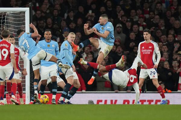 Arsenal's Gabriel (6) attempts a shot on goal during the English Premier League soccer match between Arsenal and Manchester City at the Emirates stadium in London, Sunday, Feb. 2, 2025. (AP Photo/Alastair Grant)