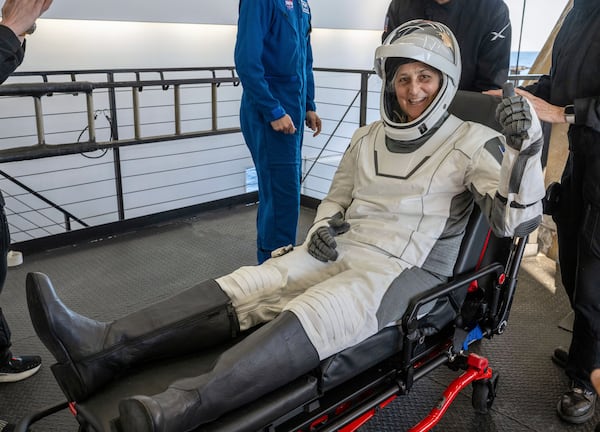 NASA astronaut Suni Williams gives a thumbs-up after being helped out of a SpaceX capsule onboard the SpaceX recovery ship Megan after landing in the water off the coast of Tallahassee, Fla., Tuesday, March 18, 2025. (Keegan Barber/NASA via AP)