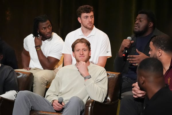 College football player Kardell Thomas speaks during a players association for college athletes meeting ahead of the college football's national title game, Saturday, Jan. 18, 2025, in Atlanta. (AP Photo/Brynn Anderson)