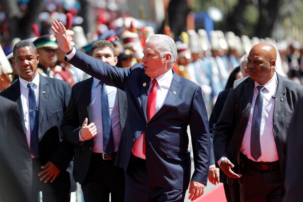 Cuba's President Miguel Diaz-Canel arrives for the swearing-in ceremony of Venezuelan President Nicolas Maduro for a third term at the National Assembly in Caracas, Venezuela, Friday, Jan. 10, 2025. (AP Photo/Cristian Hernandez)