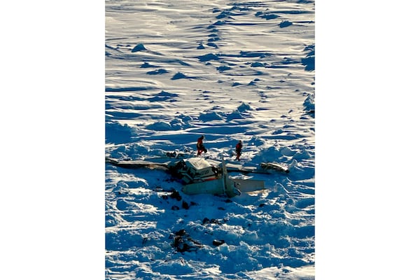 This photo provided by the U.S. Coast Guard on Feb. 7, 2025, shows a small commuter plane that crashed in western Alaska on a flight that was bound for the hub community of Nome. (U.S. Coast Guard via AP, File)